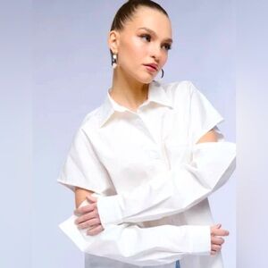 Not your boyfriend’s whiten button up shirt. Slip on this sexy, blouse.